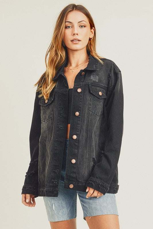 Full size distressed long sleeve denim jacket with button closures and pockets.