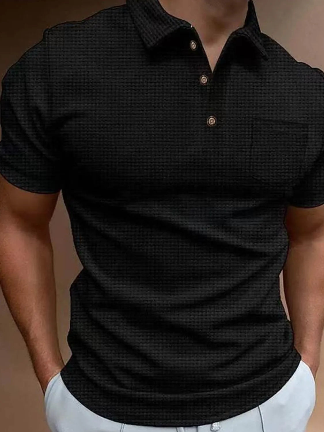Men's full size collared neck waffle-knit short sleeve polo in black.