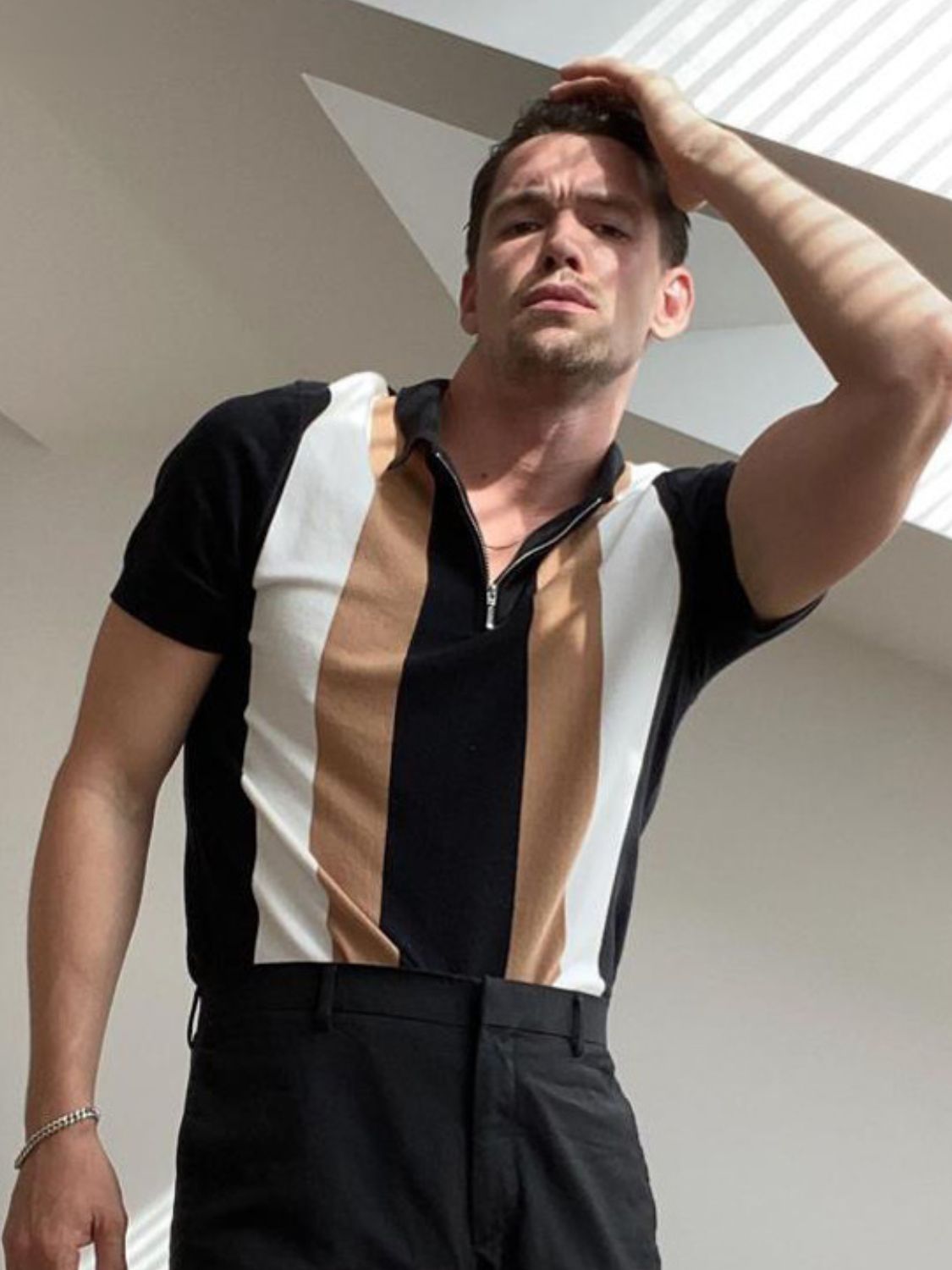 Men's full size color block short sleeve polo shirt.