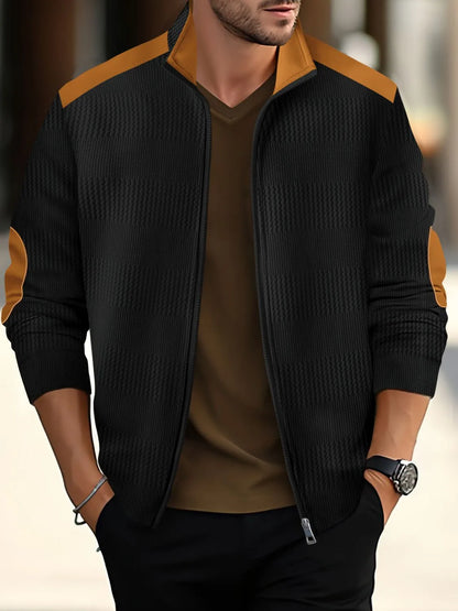Men's full size zip up long sleeve top in black and orange, made of 100% polyester with a slightly stretchy fit.