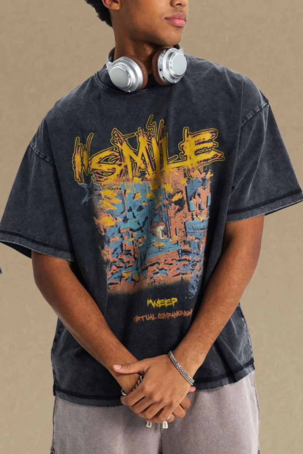 Men's graphic round neck half sleeve t-shirt in black with colorful design.