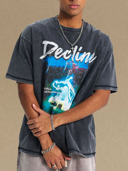 Men's graphic round neck half sleeve t-shirt in cotton with a colorful design.