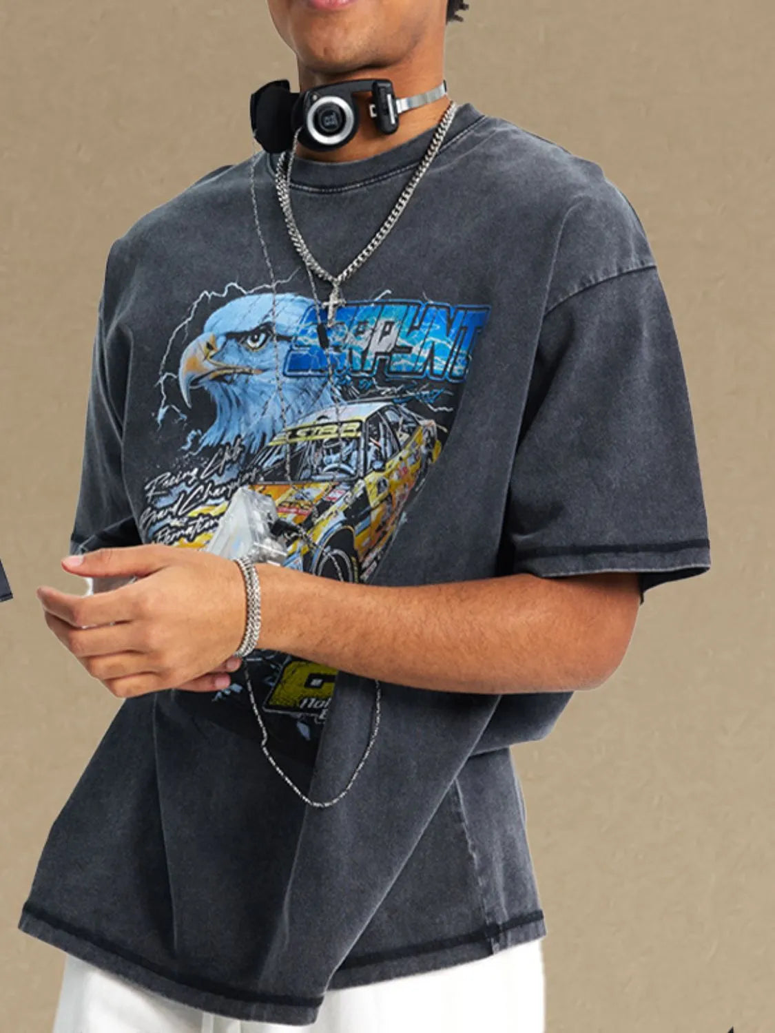 Men's graphic round neck half sleeve t-shirt with eagle and car design, slightly stretchy cotton fabric.