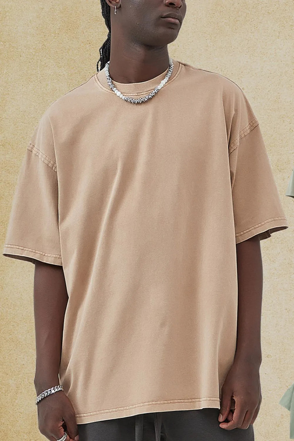 Men's round neck half sleeve t-shirt in beige, slightly stretchy cotton fabric.