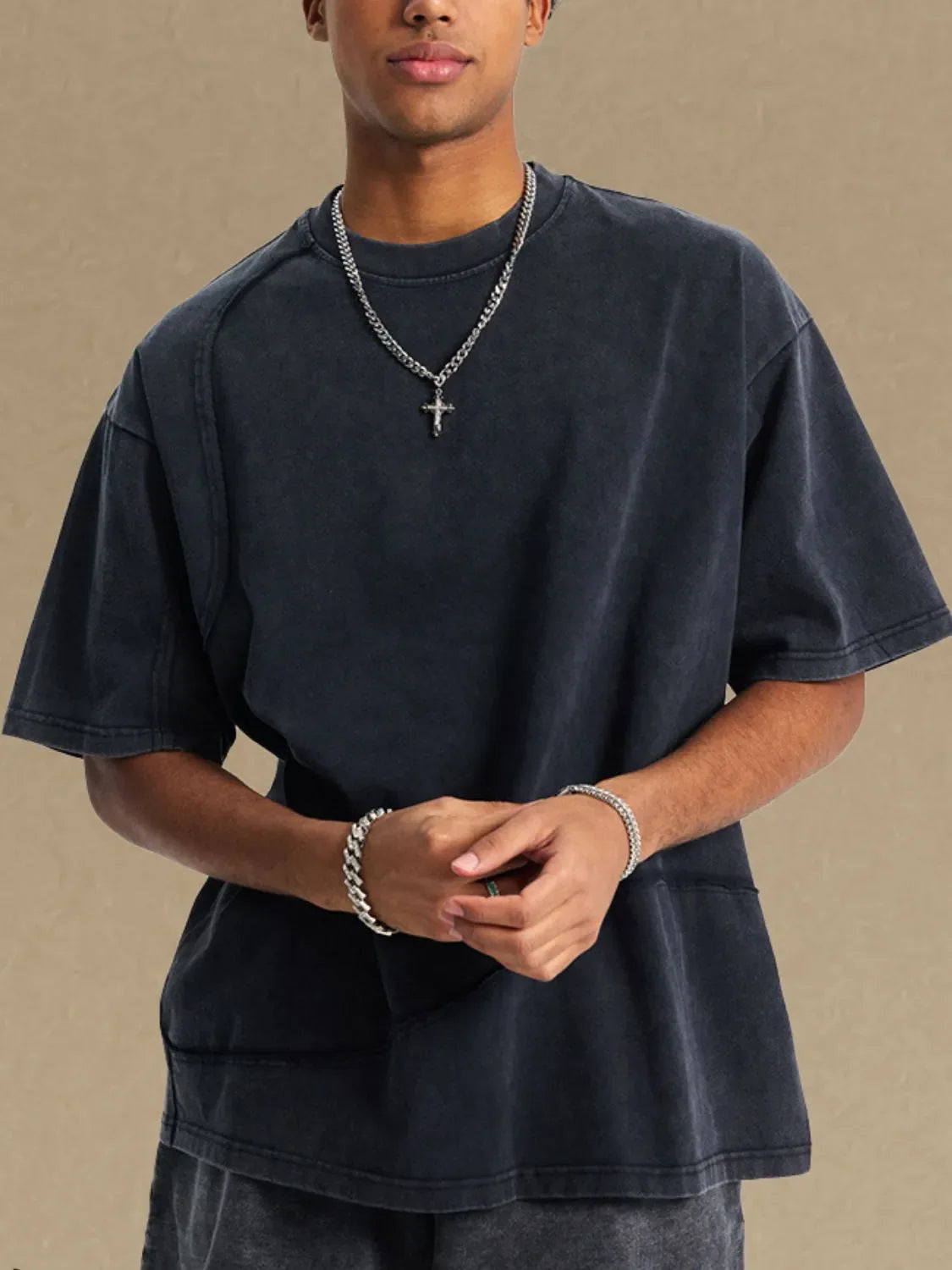 Men's round neck half sleeve t-shirt in black, slightly stretchy cotton fabric.