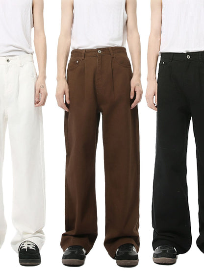 Mid rise men's jeans with pockets in white, brown, and black colors.