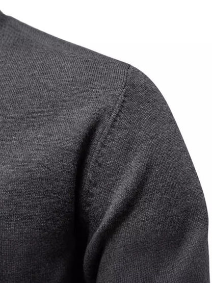 Men's round neck long sleeve sweater in dark gray with moderate stretch.