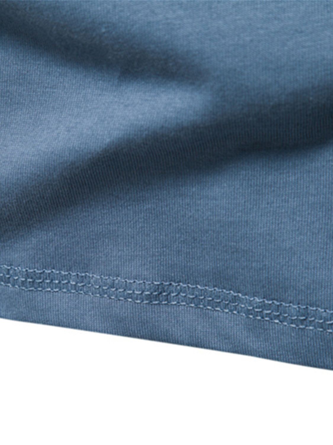 Men's Full Size Quarter Button Round Neck Long Sleeve T-Shirt fabric detail.
