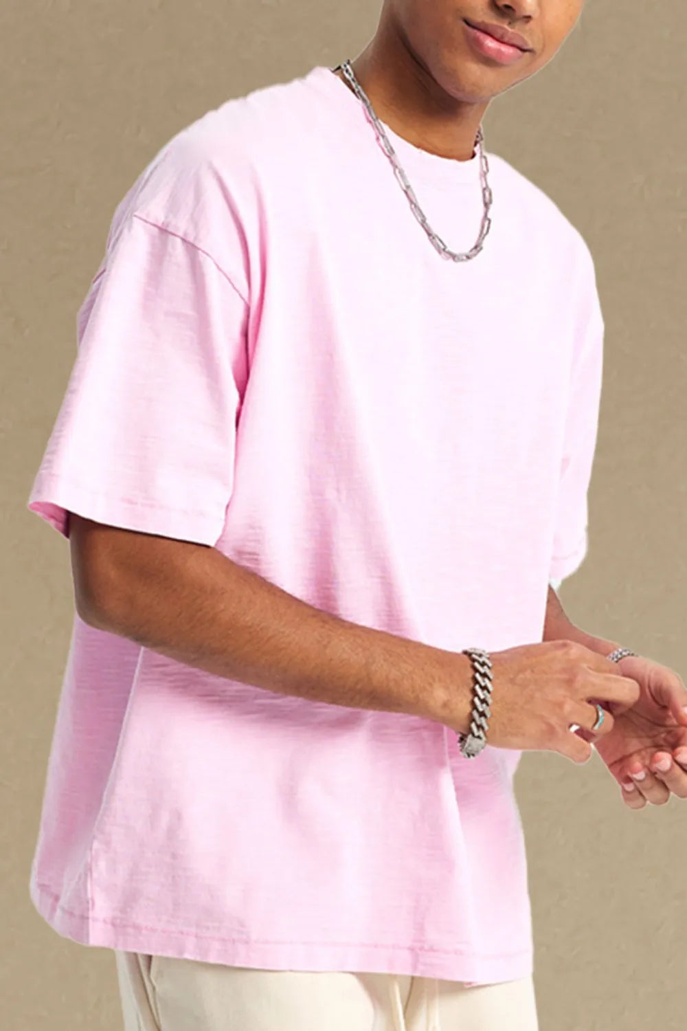 Men's pink round neck half sleeve t-shirt made of 100% cotton.