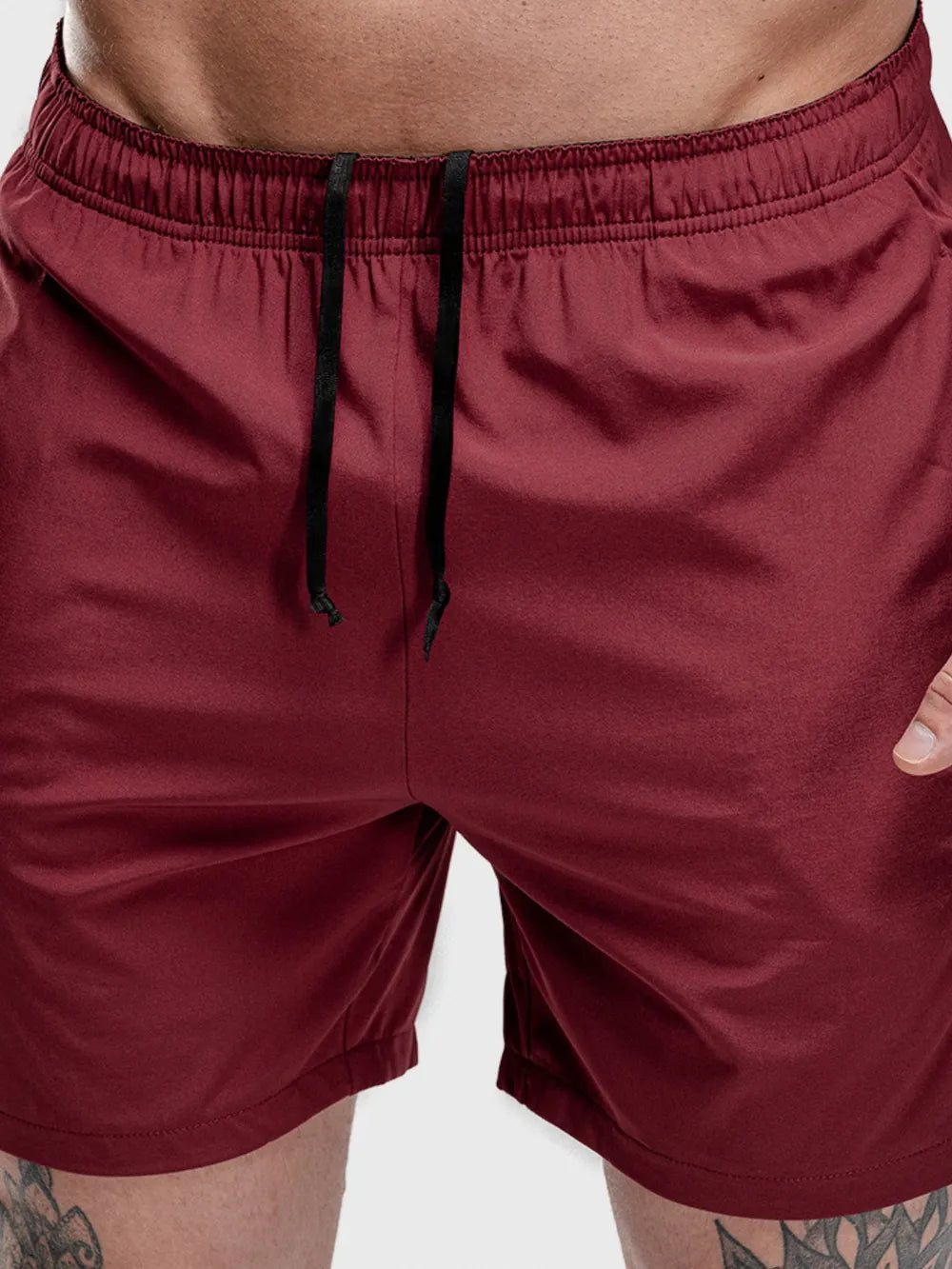 Men's quick-dry drawstring active shorts in maroon, featuring a stretchy fit and customizable drawstring.