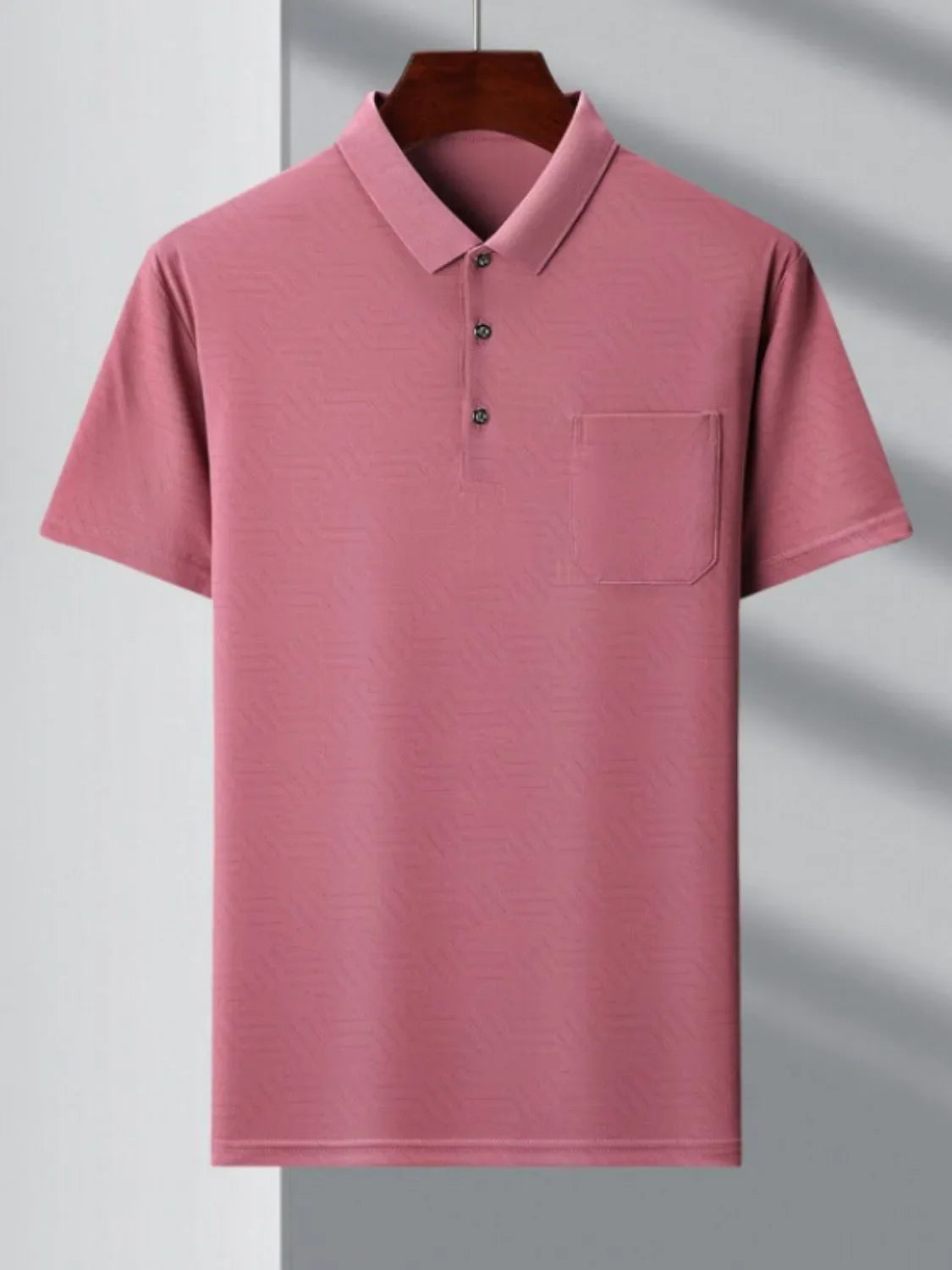 Men's plus size collared neck short sleeve polo, stretchy polyester and spandex blend, basic style in pink, featuring front pocket.