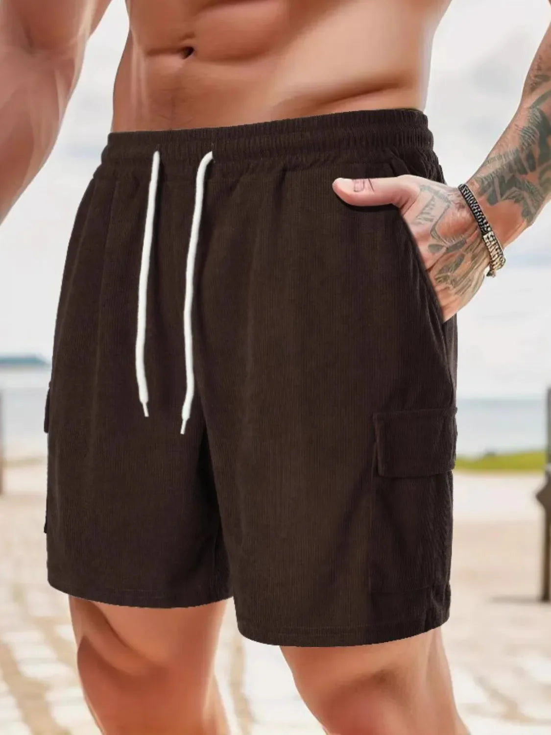 Men's drawstring shorts with pockets, basic style, 100% polyester.