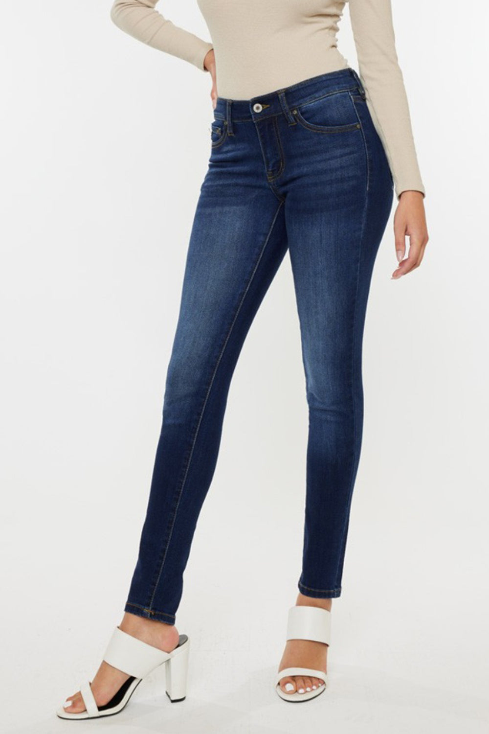 Kancan Mid Rise Gradient Skinny Jeans with flattering fit and pocket details.