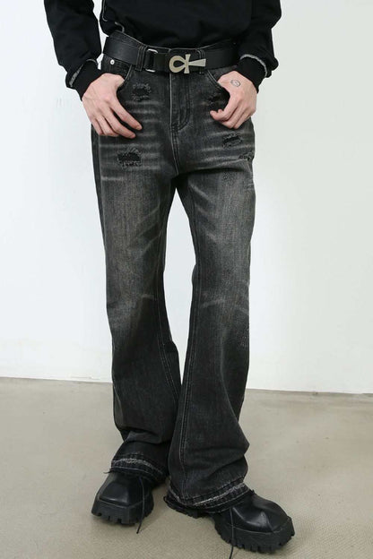 Men's frayed hem bootcut jeans, basic style, no stretch, black footwear.