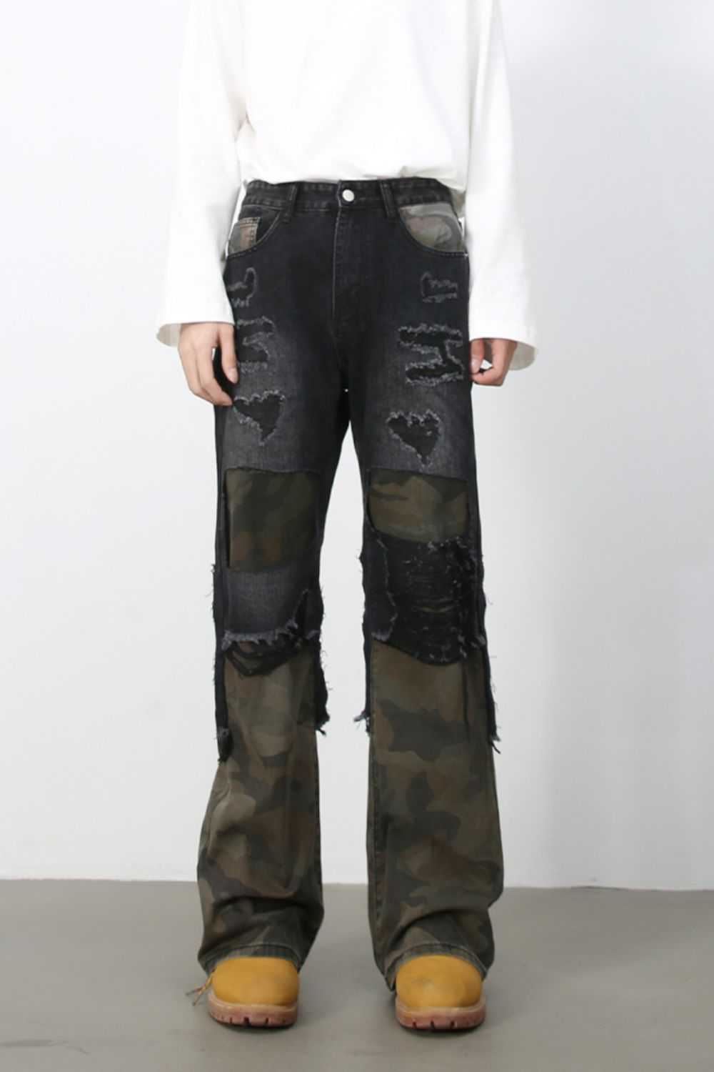 Men's frayed hem camouflage jeans with distressed design.