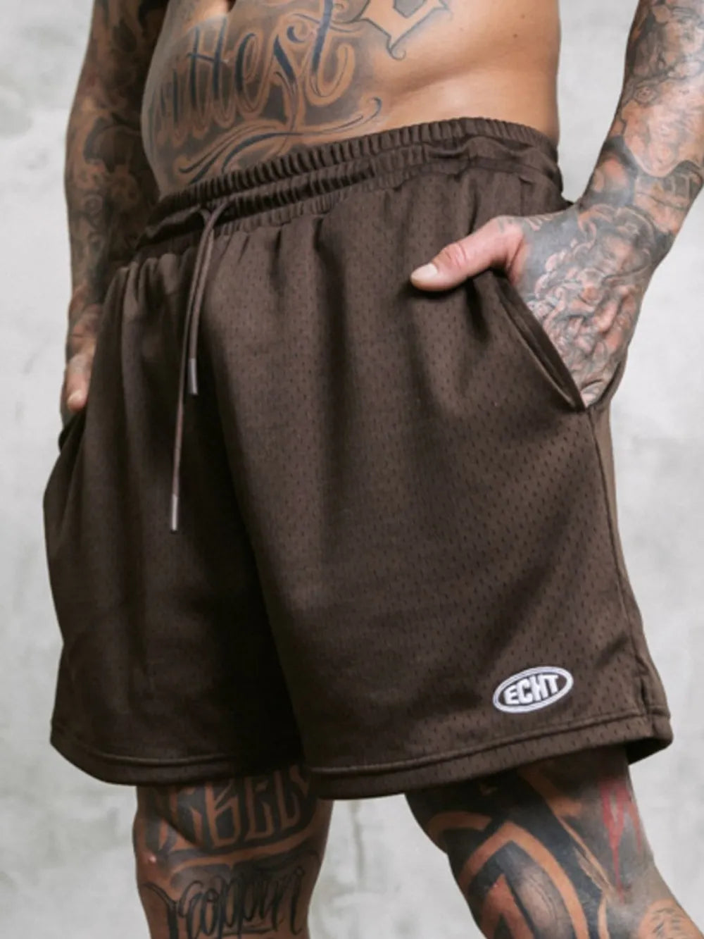 Men's plus size drawstring breathable active shorts in dark color.