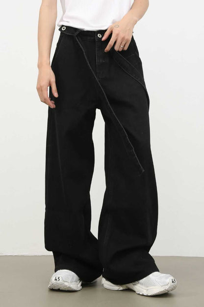 Men's mid rise wide leg jeans in black, basic style, no stretch, made from cotton, viscose, and polyester.