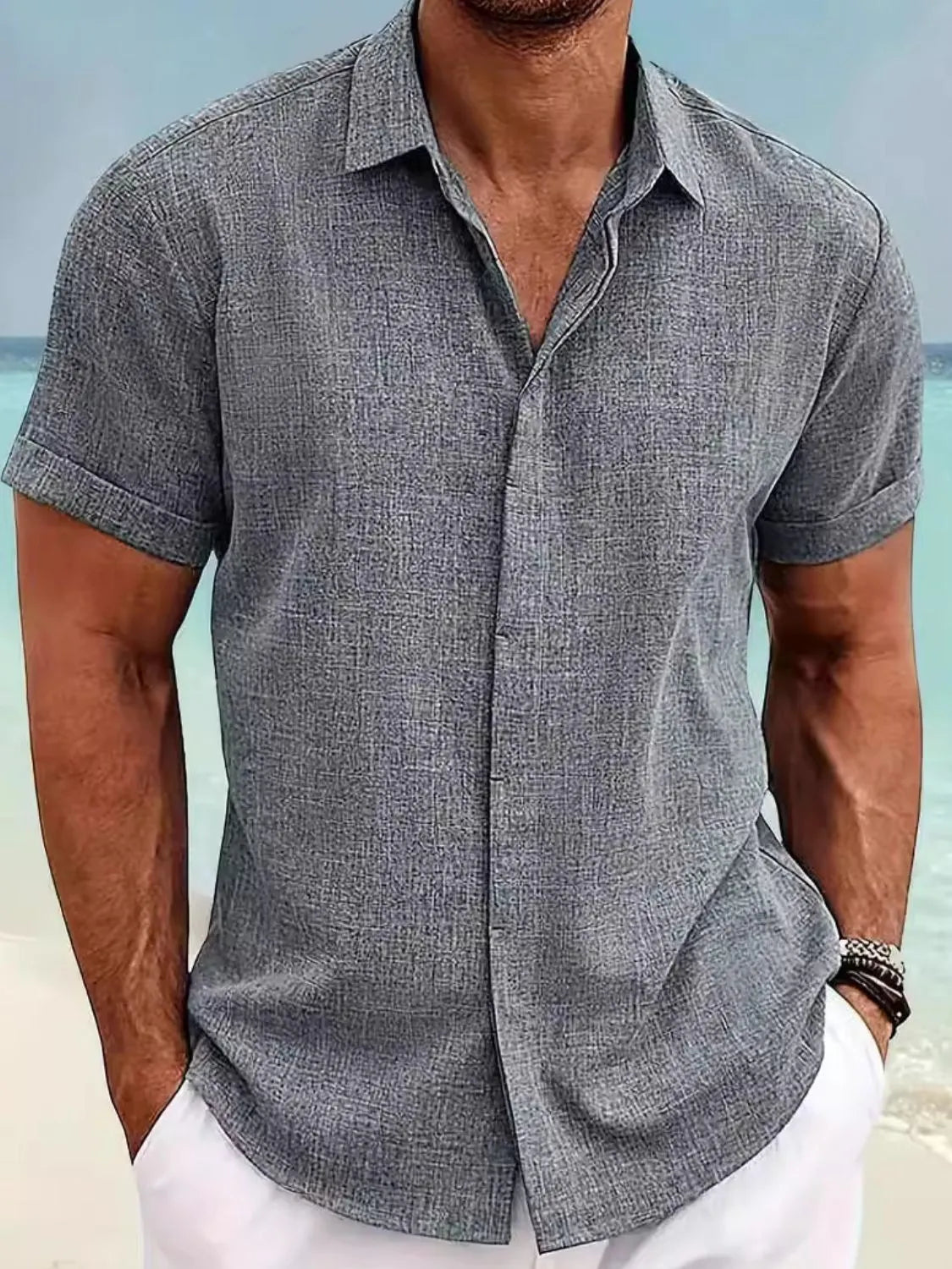 Men's full size collared neck short sleeve shirt, plus size, grey textured, beach setting.