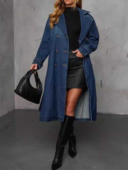 Button up long sleeve longline denim jacket with no stretch, worn over black outfit.