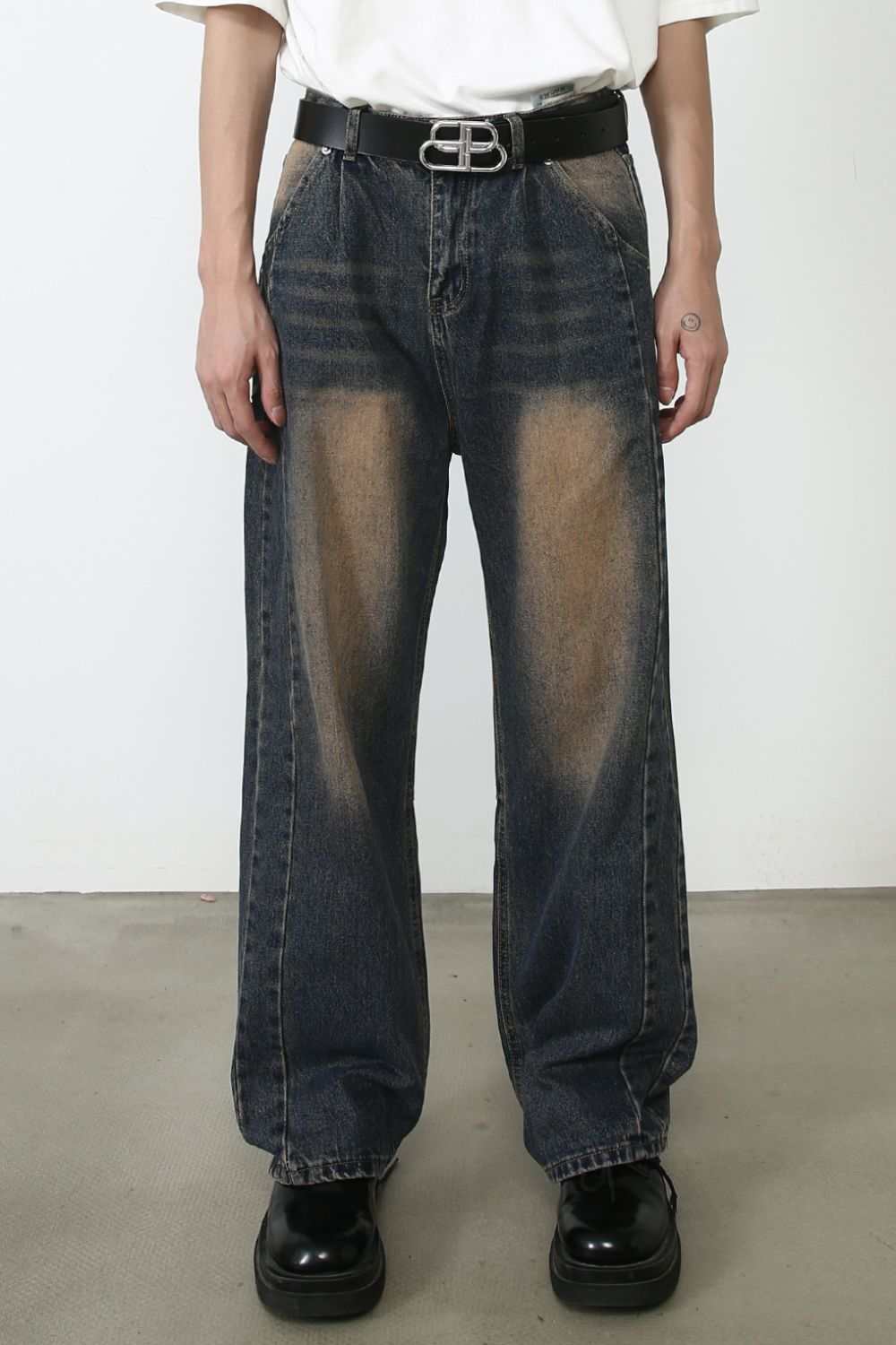 Men's loose fit jeans with a basic style, no stretch, featuring a dark wash.
