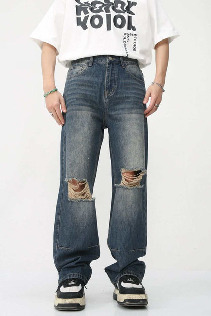 Distressed jeans with pockets, basic style, no stretch, cotton blend.