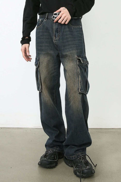 Men's baggy jeans with cargo pockets in dark denim, featuring a pocketed design and straight leg fit.