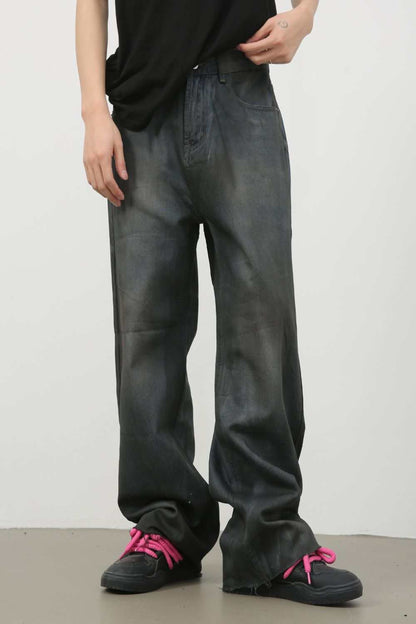 Men's frayed hem jeans with pockets, raw hem style.