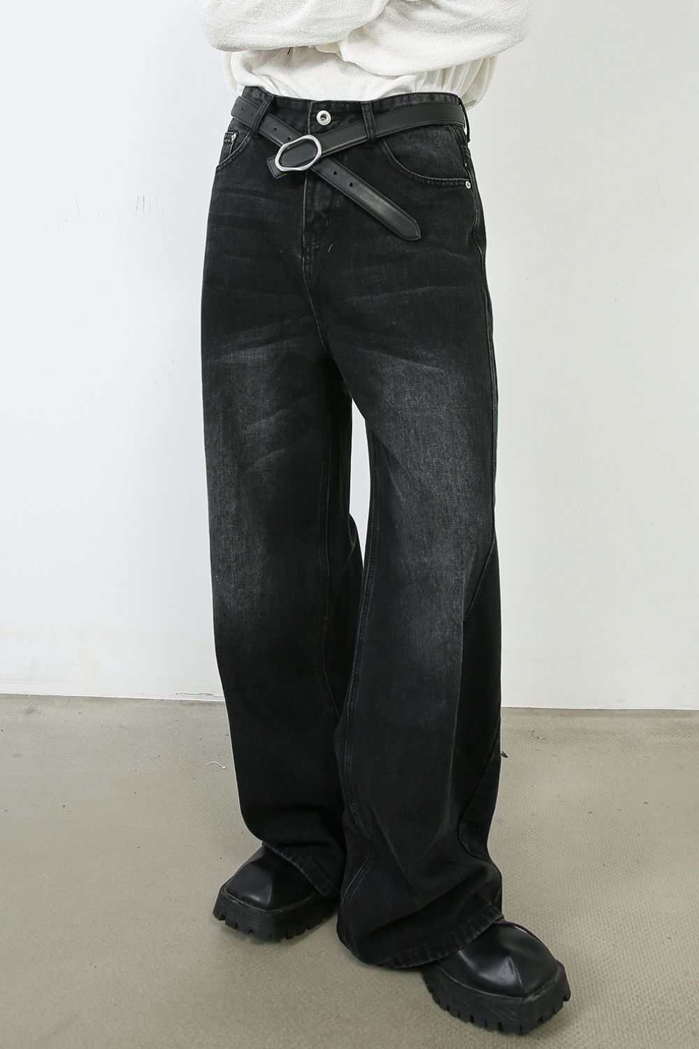 Men's wide leg jeans in black, basic style, no stretch, cotton blend material.