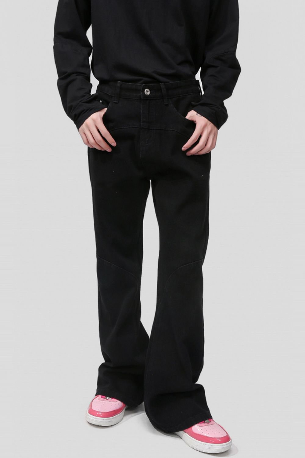 Mid rise black jeans with pockets, no stretch fabric. 