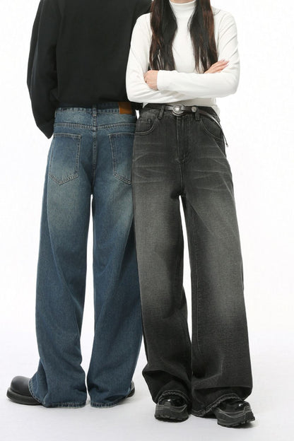 Wide leg pocketed jeans in blue and black, cotton-polyester blend, worn by two models.