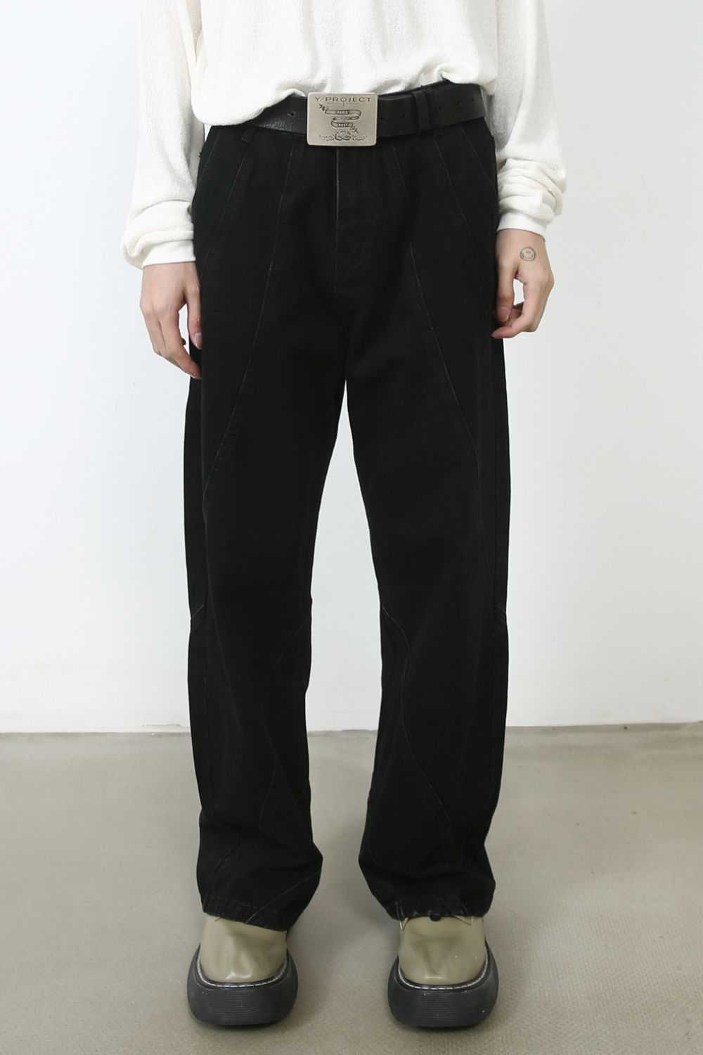 Men's black baggy jeans with pockets, no stretch, basic style.