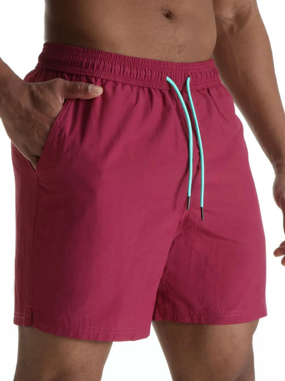 Men's plus size drawstring shorts with pockets in red color.