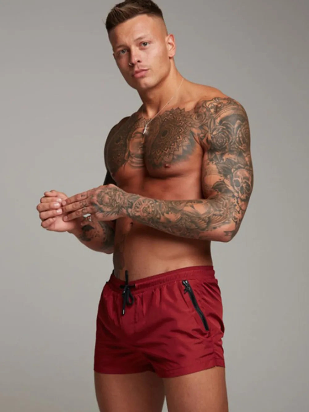 Men's drawstring active shorts, slightly stretchy, nylon polyester blend, basic style.