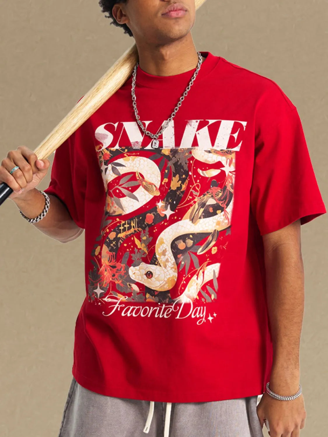 Men's graphic round neck t-shirt with snake design, red color, half sleeves.