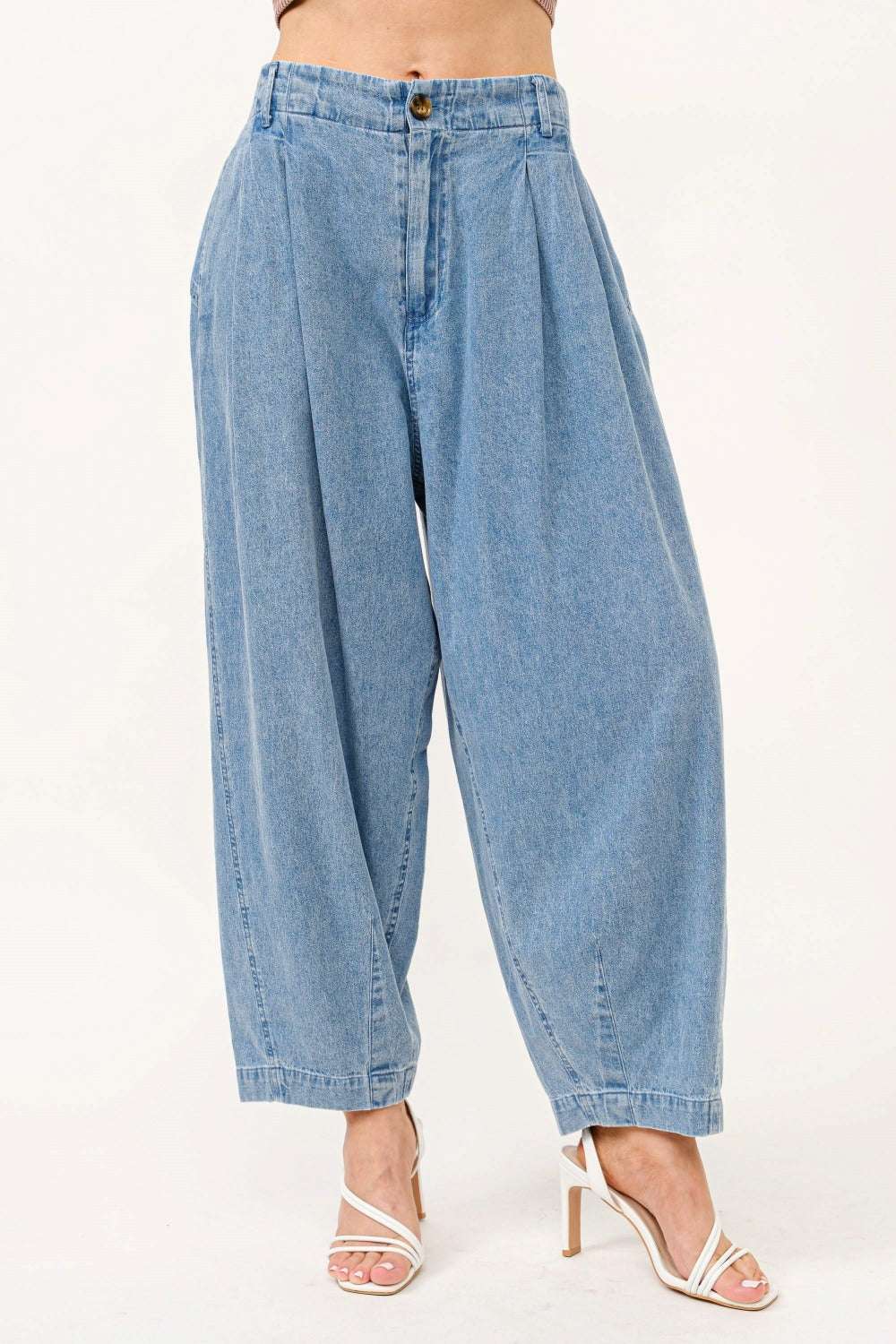 Elastic back pleated baggy jeans with relaxed fit and stylish comfort.