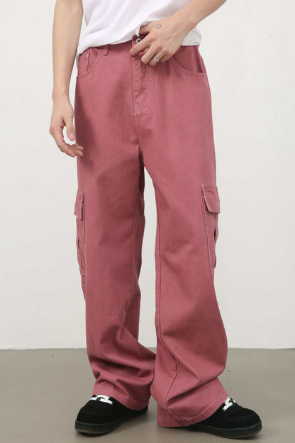 Men's mid rise pink cargo jeans with basic style and pockets.
