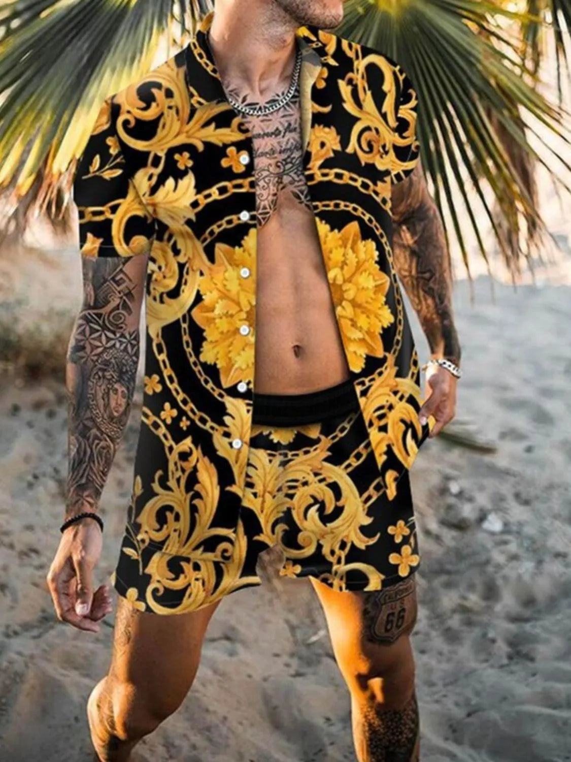 Men's plus size printed short sleeve shirt and shorts set on beach.