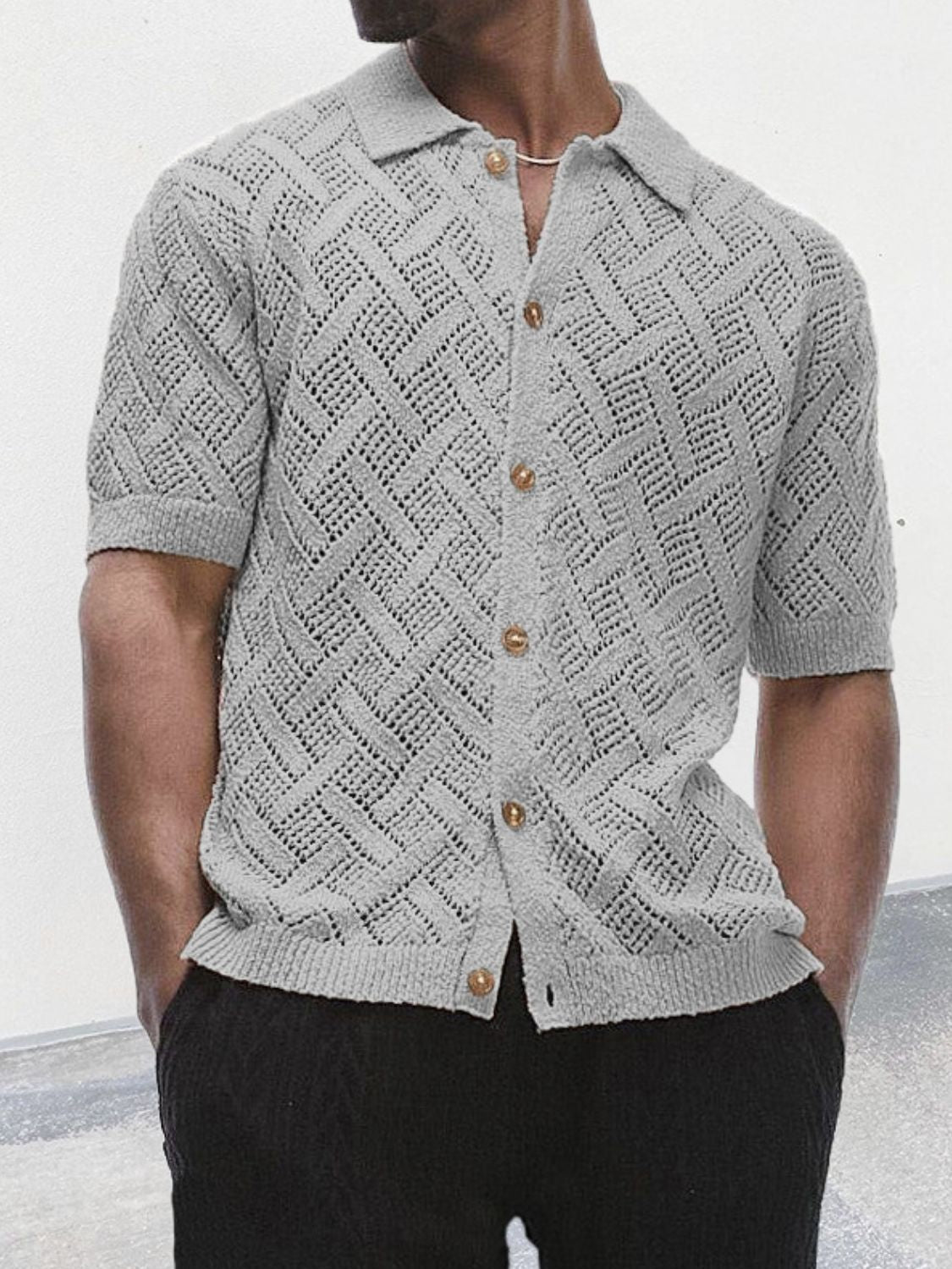 Men's button down eyelet knit shirt with collared neck in gray.