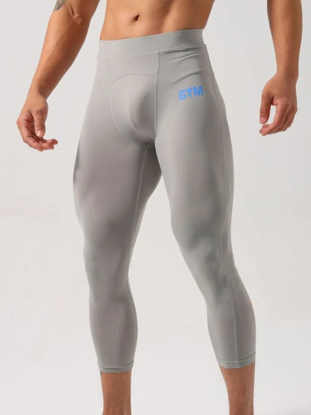 Men's high waist active leggings in light gray, stretchy nylon-polyester blend.