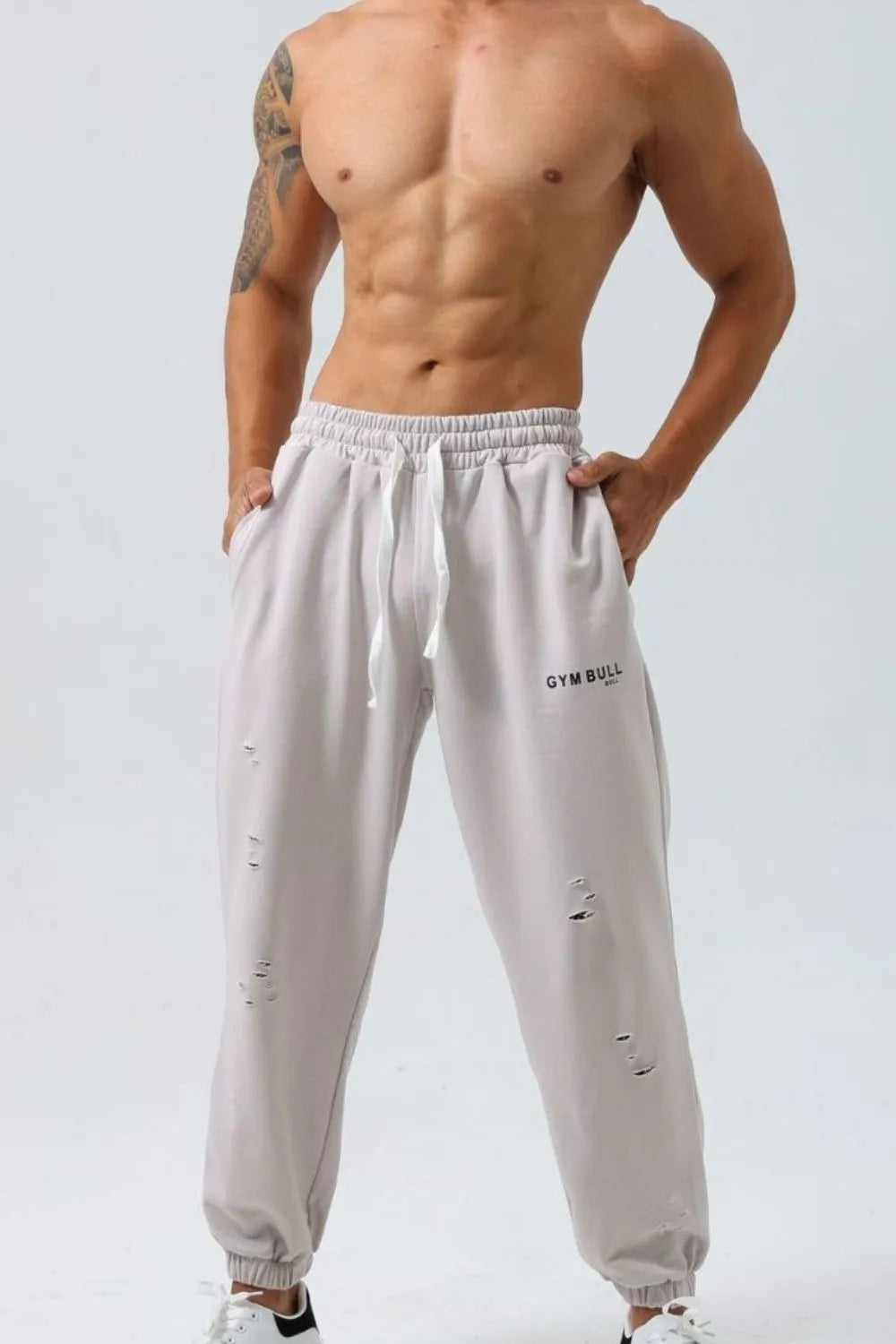 Men's plus size distressed drawstring joggers in 100% cotton.