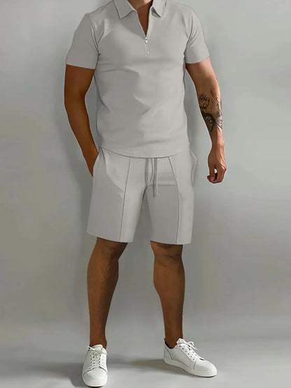 Men's full-size collared neck short sleeve top and shorts set, slightly stretchy, nylon-polyester blend, basic style.