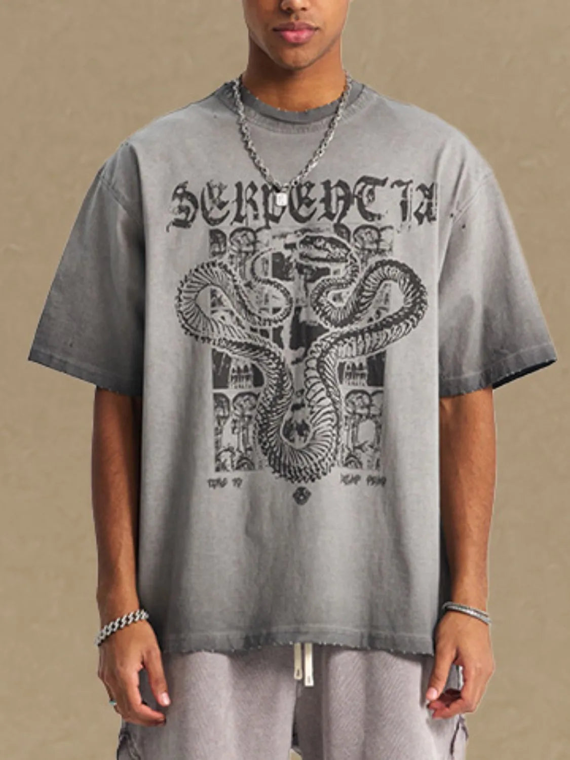 Men's graphic round neck half sleeve t-shirt with snake design, made of 100% cotton.