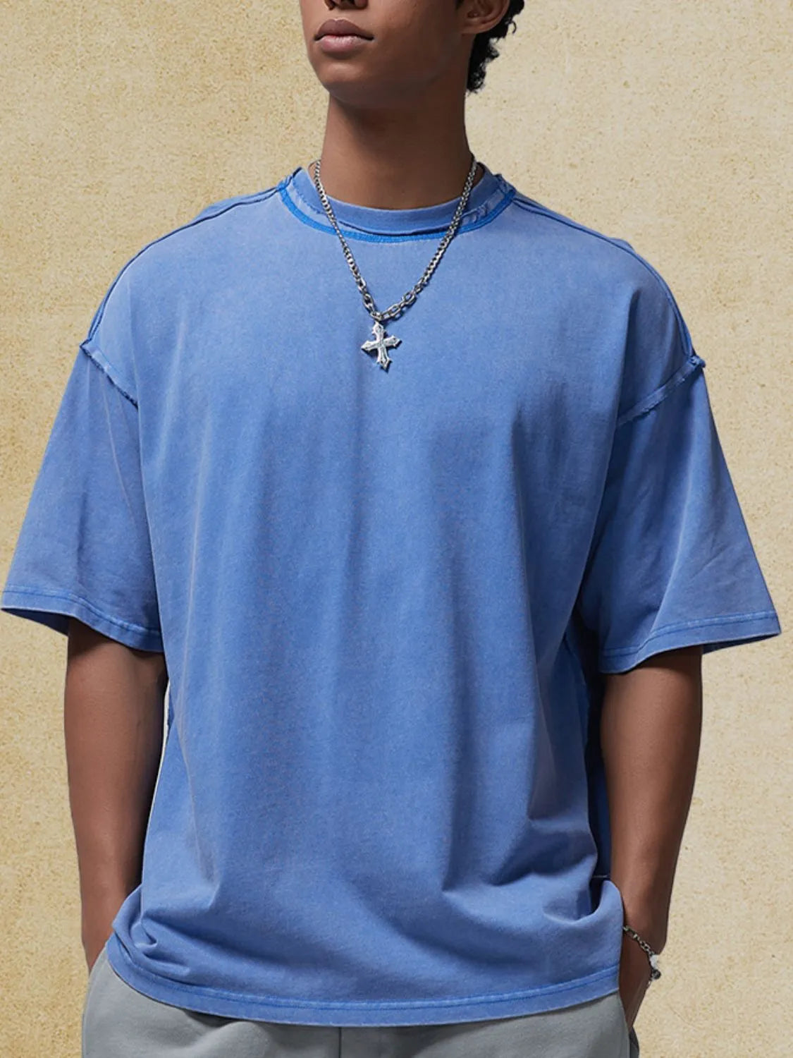 Men's round neck blue half sleeve t-shirt with basic style and slightly stretchy cotton fabric.
