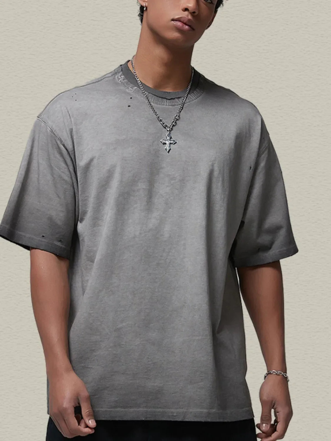 Men's round neck half sleeve t-shirt in gray, slightly stretchy 100% cotton.