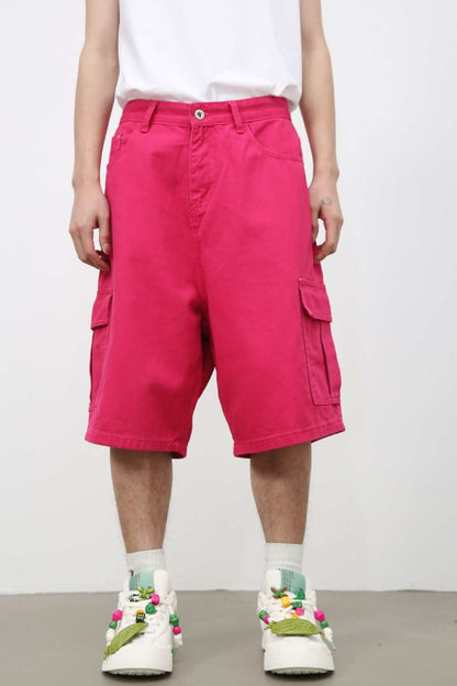 Men's mid rise denim shorts with cargo pockets and button closure, no stretch, 100% cotton.