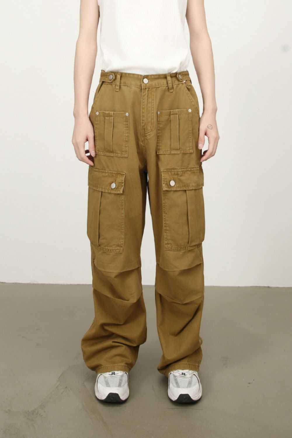 Men's mid rise cargo jeans in brown, featuring multiple pockets, no stretch, made of 100% cotton.