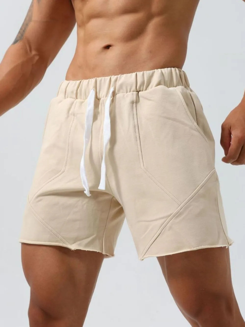 Men's Plus Size Drawstring Elastic Waist Shorts in beige, showcasing comfort fit.