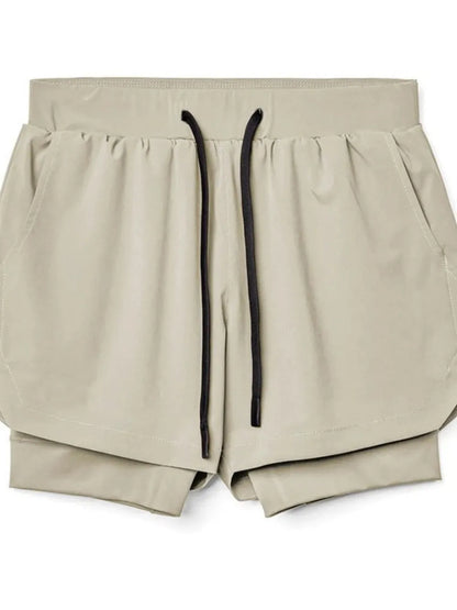Men's drawstring active shorts in beige with black drawstring.