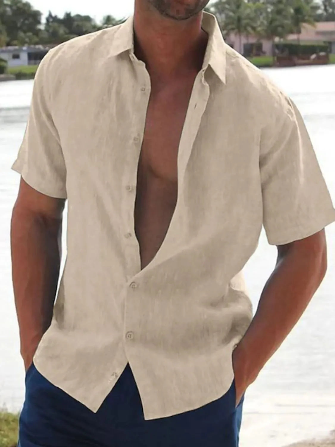 Men's full size button up short sleeve shirt in light color, slightly stretchy fabric.