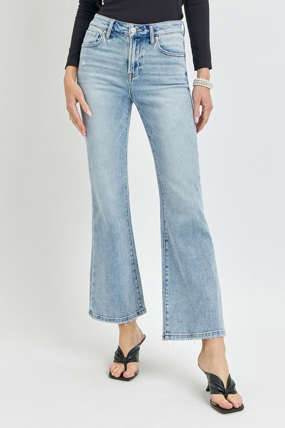 Full size high rise ankle flare jeans with vintage-inspired design, slightly stretchy fabric, and cropped length.